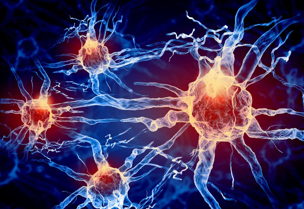 Illustration of neural network with interconnected neurons in blue and orange, depicting synapses and electrical impulses on a dark background.